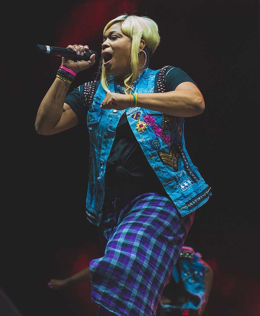 Tionne Watkins performing on stage