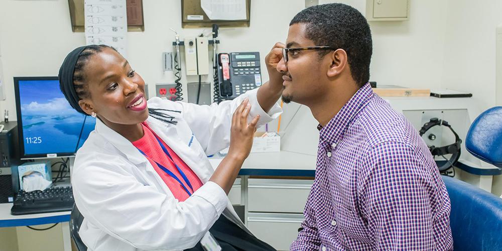 Doctor examining a person's vision